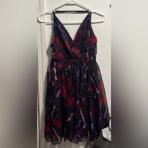 Take the Lulus Britannia Navy Blue Print Skater Dress to the party and beyond!